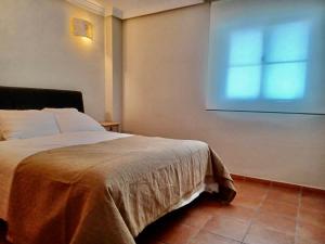En eller flere senge i et værelse på Apartamento Torreblanca, Fuengirola