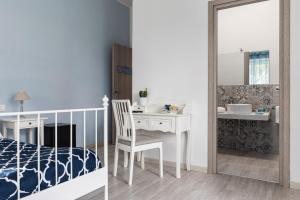 Ένα ή περισσότερα κρεβάτια σε δωμάτιο στο B&B Sapore di Mare Serapo +19 φωτογραφίες