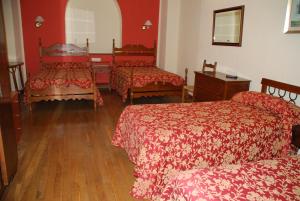 Postel nebo postele na pokoji v ubytování Hostal Ayestaran I