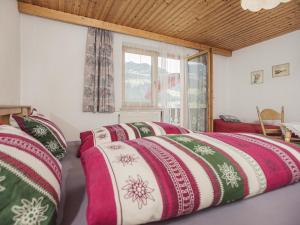 מיטה או מיטות בחדר ב-Ferienwohnung Martin