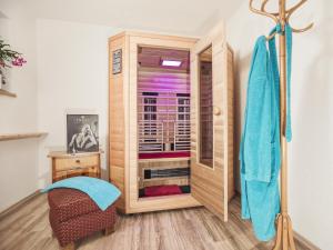 a room with a wooden closet with a window at Ferienwohnung Martin in Zellberg