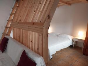 Ένα ή περισσότερα κρεβάτια σε δωμάτιο στο Casa Algarvia G&S