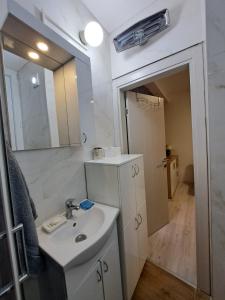 Ένα μπάνιο στο Apartment BeoSun
