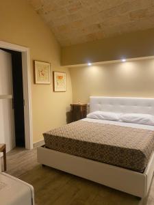 A bed or beds in a room at Solo Vip