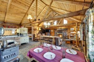 a kitchen with a table with wine glasses on it at Remote Escape Klamath Falls Cabin By Lake and Hikes in Klamath Falls
