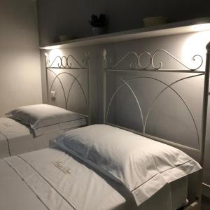 Letto o letti in una camera di Borgo Diaz