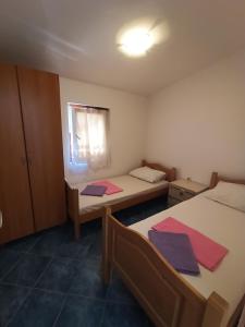 Postel nebo postele na pokoji v ubytování TLM Apartments