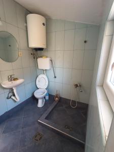 Koupelna v ubytování TLM Apartments