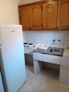 Kuchyň nebo kuchyňský kout v ubytování TLM Apartments