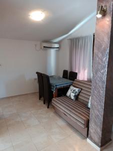 Posezení v ubytování TLM Apartments