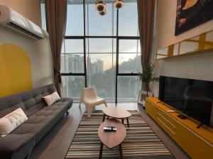 Posezení v ubytování Studio Loft Empire Damansara Free WiFi & Parking
