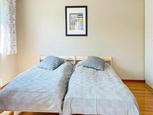 Llit o llits en una habitació de Holiday home ELLÖS VII