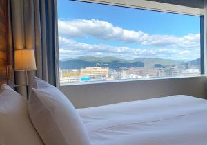 Nespecifikovaný výhled na hory nebo výhled na hory při pohledu z hotelu