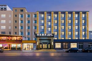 a rendering of a hotel with cars parked in front of it at Nostalgia Hotel S - Beijing National Convention Center in Beijing