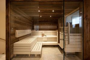 Postel nebo postele na pokoji v ubytování Hotel Walliserstube