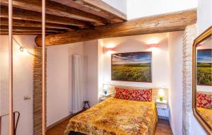 A bed or beds in a room at Amazing Home In Mazzolla With Wifi