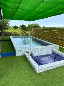 Bazén v ubytování Green Resort nebo v jeho okolí