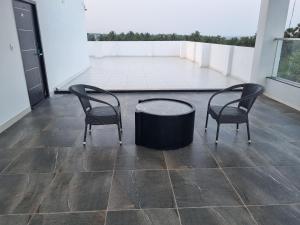 Balkón nebo terasa v ubytování PLUTUS RESIDENCY