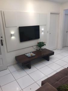 Et tv og/eller underholdning på Conforto aproveitando Santos!