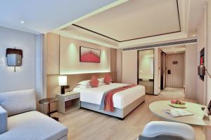 Letto o letti in una camera di SSAW Boutique Hotel Yingyang