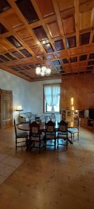 a large dining room with a table and chairs at ŠulcBurg in Cetenov +24 photos