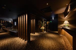 Postel nebo postele na pokoji v ubytování HOTEL Sweets
