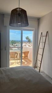 Posteľ alebo postele v izbe v ubytovaní Penthouse with amazing sea view