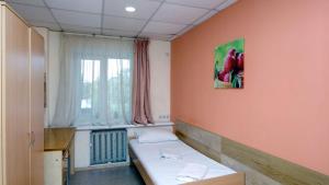 Posteľ alebo postele v izbe v ubytovaní Hostel Podolski Plus