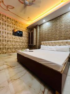 Ένα ή περισσότερα κρεβάτια σε δωμάτιο στο The Bella Guesthouse +23 φωτογραφίες