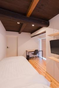 Postel nebo postele na pokoji v ubytování FARMSTAY miyuki-street "Goen"