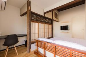 Postel nebo postele na pokoji v ubytování FARMSTAY miyuki-street "Goen"