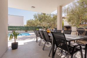 Bazén v ubytování Sunluxvilla ,Heated Pool, IR Sauna nebo v jeho okolí