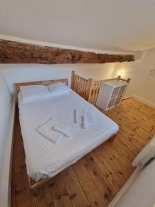 Posteľ alebo postele v izbe v ubytovaní Maison de ville des Arènes