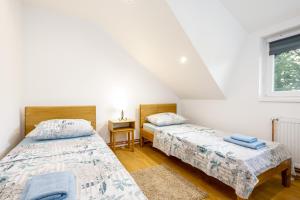 Katil atau katil-katil dalam bilik di Apartman Medved