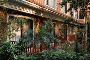Giardino di Hotel Thrive, A Tropical Courtyard