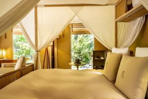Postel nebo postele na pokoji v ubytování KEIKOKU GLAMPING TENT