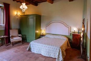 Postel nebo postele na pokoji v ubytování Agriturismo Bio Fattoria di Pietra