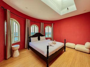 Ein Bett oder Betten in einem Zimmer der Unterkunft Renjana Beach House