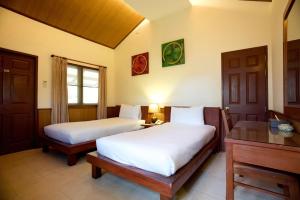 Postel nebo postele na pokoji v ubytování Pinnacle Samui Resort + 37 fotografií