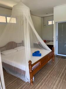 Postel nebo postele na pokoji v ubytování Khao Sok Hill Top Resort