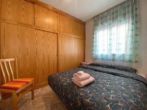 Posteľ alebo postele v izbe v ubytovaní appartement plage des naufragés