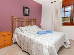 Postel nebo postele na pokoji v ubytování AMPLIO CHALET CON GRAN PISCINA + 11 fotografií