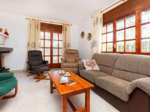 Posezení v ubytování AMPLIO CHALET CON GRAN PISCINA