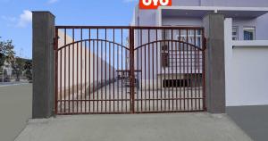 an open gate in front of a house at Flagship Mt Corporate Suites Pari Chowk Near Pvr Ansal Plaza Greater Noida in Greater Noida