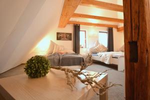 a bedroom with two beds in a attic at CO08-RI Apartment in Coburg 