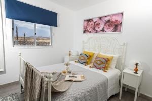 Posteľ alebo postele v izbe v ubytovaní Casa Virginia Corralejo by iRent Fuerteventura