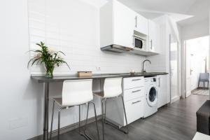 Cuisine ou kitchenette dans l'établissement Apartamento San Valentin