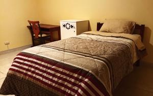 Postel nebo postele na pokoji v ubytování Casa Sucre Hostel Ayacucho