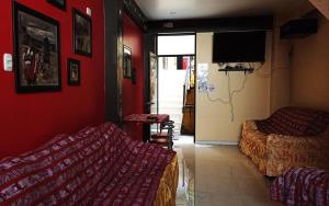 TV a/nebo společenská místnost v ubytování Casa Sucre Hostel Ayacucho