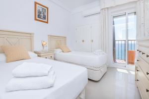 Postel nebo postele na pokoji v ubytování Exclusivas vistas al Mediterráneo + 12 fotografií